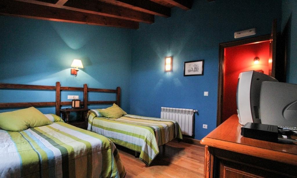 Penzion La Quintana Sinariega Pokoj fotografie